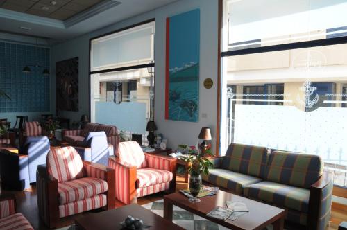 共用Lounge/電視區, 普圖德拉斯尼威斯酒店 (Hotel Puerto de Las Nieves) in 阿蓋特