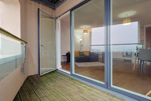 Bright 2BR Oasis with Balcony in Cardiff Bay - Tap to explore photos