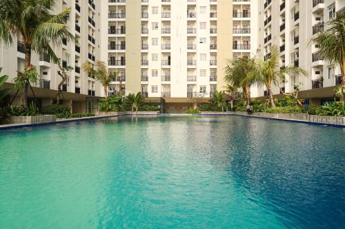 Swimming pool, Best and Simply Homey Studio Cinere Resort Apartment By Travelio in Limo