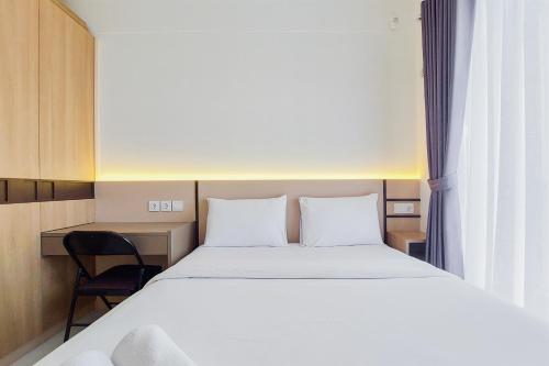Best and Nice Studio at Sky House BSD Apartment near AEON Mall By Travelio, Tangerang