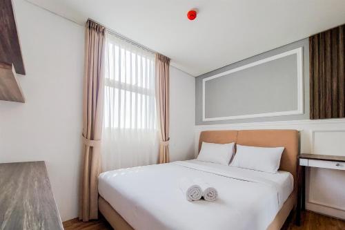 Comfort Stay Apartment 1BR at Tuscany Residences By Travelio, Tangerang Selatan