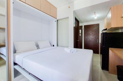 Best Price and Homey Studio Transpark Bintaro Apartment By Travelio
