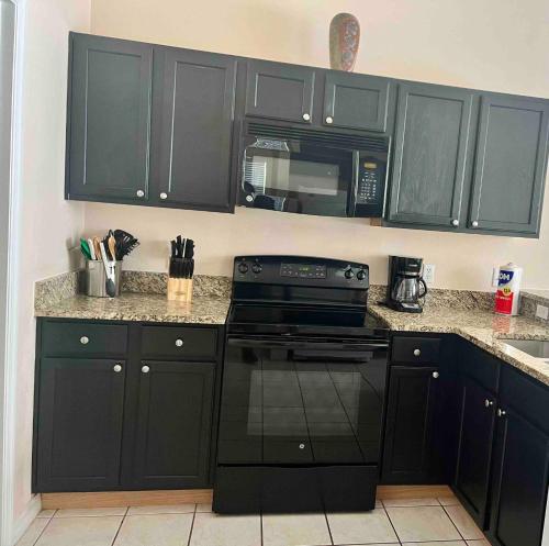 Book Now Disney and Theme Parks Days, Poolside Family Villa Awaits in Davenport, USA