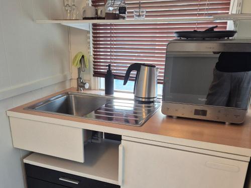 ห้องครัว, Vertshuset Fannarheimr - Bed &Breakfast in อูร์คังเงอร์