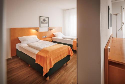 Ariva Boardinghouse Platanenhof - Tap to explore photos