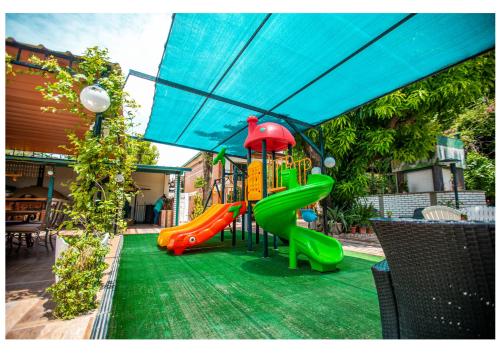 Spēļu laukums, HOTEL BOUTIQUE EL RANCHO OLIVO in Villamontes