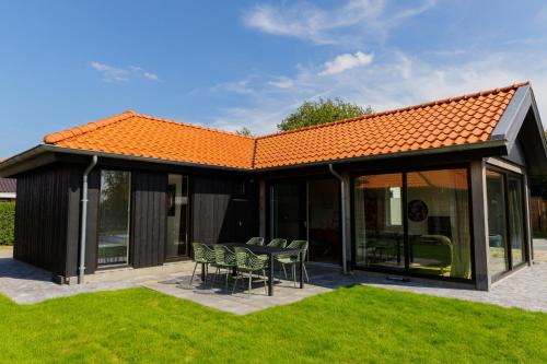 المنظر الخارجي, La Casita, Luxe Chalet Aan Het Water met Airco in Dongeradeel