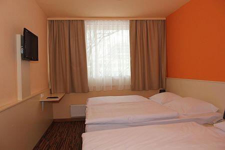 City Budget Hotel - Photo 5