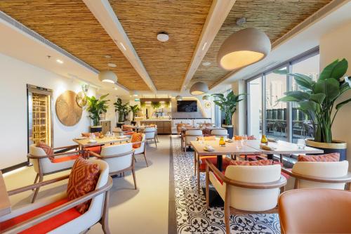 Restaurant, Holiday Inn Dubai Village Circle by IHG in Jumeirah Village Circle