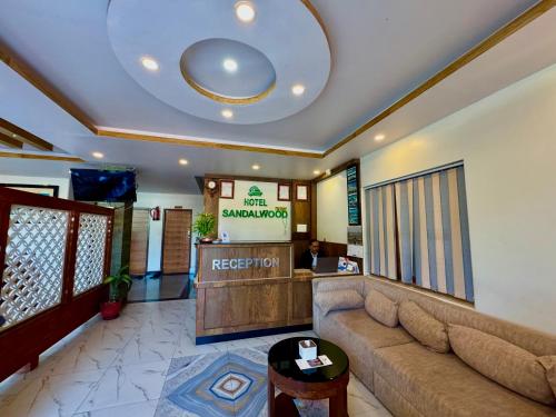 Közös társalgó / TV, Hotel Sandalwood in Damside Pardi
