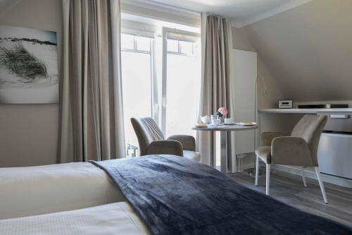 Gästehaus Orion - Doppelzimmer 5 (Gastehaus Orion - Doppelzimmer 5) in Spiekeroog