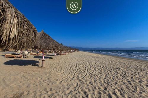 Cozy Beachfront Studio - Beach Club - Pools in Nuevo Vallarta , Mexico