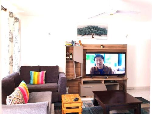 טרקלין, דירות באזור Bamburi, בגודל 85 מ"ר, עם 2 חדרי שינה ו- 1 חדרי רחצה פרטיים (Casa Mia) in מומבסה