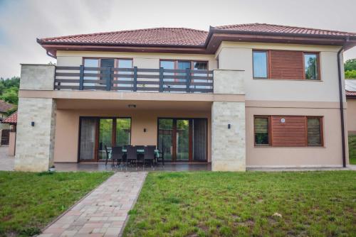 Dārzs, Relax Wellness Apartman Komlóska (Relax Wellness Apartman Komloska) in Komlóska