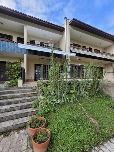 과루자 Condominio Clube lazer total na Praia da Enseada 4성급 싱글룸 수영장