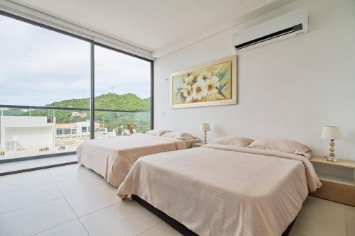 Cómoda Suite l Balcón l Tv 55'