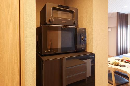 Deluxe Japanese Room with Washing Machine image 4
