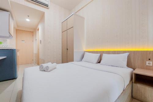 Simply Look and Comfort Studio Tree Park City BSD Apartment By Travelio in Kelapa Dua