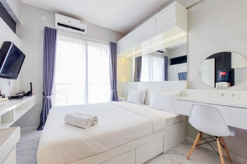 Simply and Restful Studio Apartment at Sky House BSD By Travelio, Tangerang
