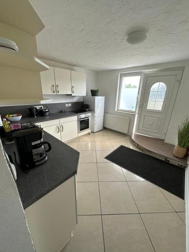 ห้องครัว, Gemütliche Unterkunft 3-Raum (Gemutliche Unterkunft 3-Raum) in ฮอยเอิร์สแวร์ดา