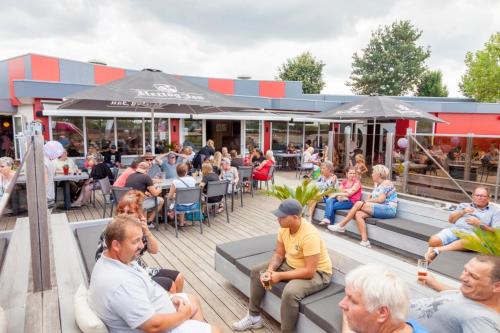 Erkély/terasz, Glamping Betuwestrand in Verspreide huizen Beesd