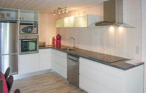 Kitchen, Holiday Home Kaprifolievej Ebeltoft X in Vibaek Strand