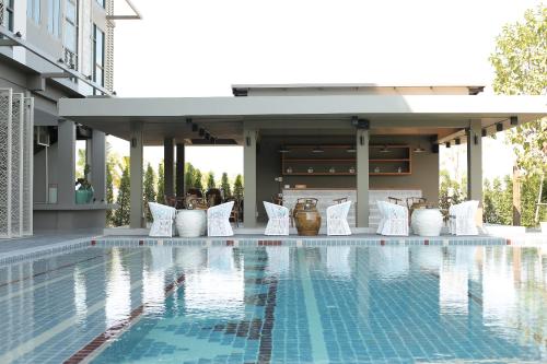 Swimming pool, Navela Hotel & Convention in Ratchaburi