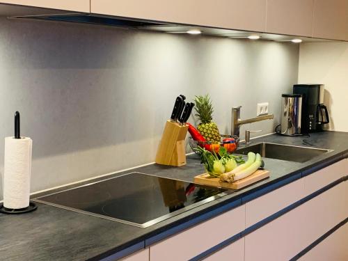 virtuve, Ferienwohnung triLogie am See - Maulbeere in Stetten (Baden-Wurttemberg)