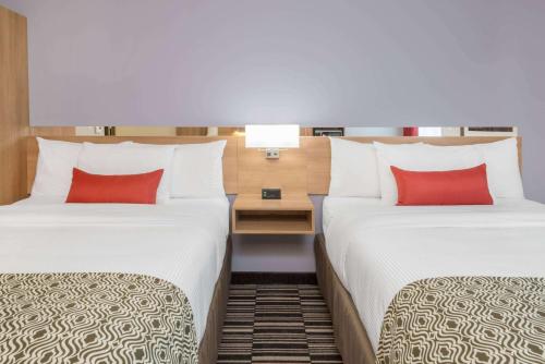 Queen Room with Two Queen Beds and Shower Only - Non-Smoking