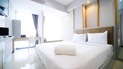 Simple and Cozy Studio at Benson Supermall Mansion Apartment By Travelio, Surabaja