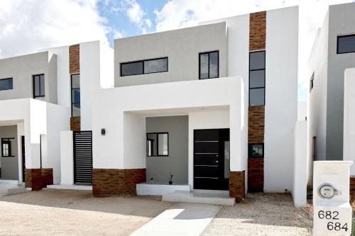 White Stone by Fidalsa in Dzitya, Mexico