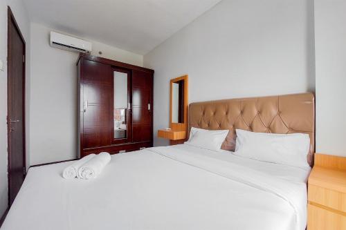 Nice and Comfort 1BR Apartment at Scientia Residence By Travelio