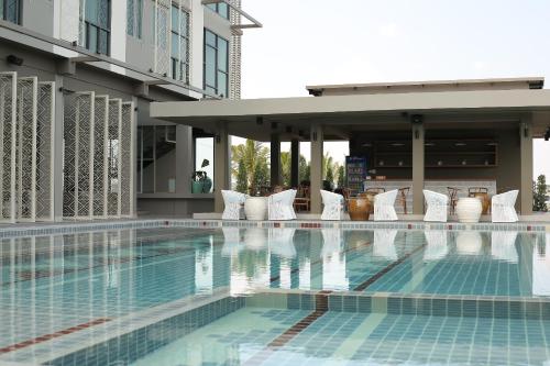 Swimming pool, Navela Hotel & Convention in Ratchaburi