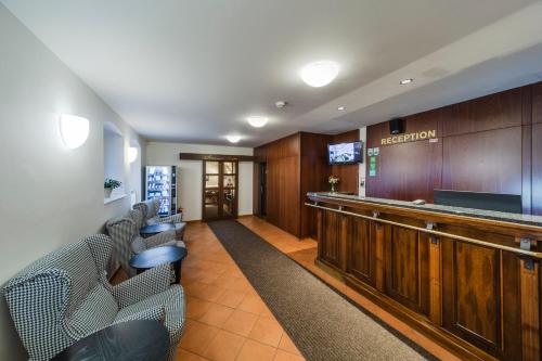 Archibald At The Charles Bridge near Franz Kafka Múzeum