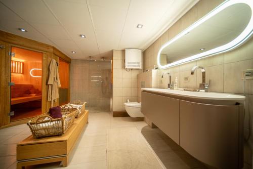 Appartement de prestige dans chalet Novalsia à Méribel avec sauna (Appartement de prestige dans chalet Novalsia a Meribel avec sauna) in เลเซเรตตา