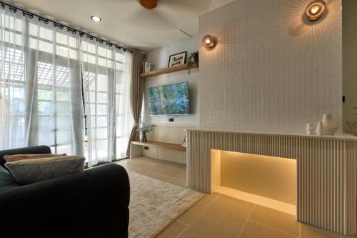 บ้านพักตากอากาศ 4 ห้องนอน (Four-Bedroom Vacation Home)