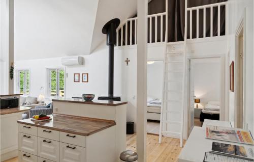 Kitchen, Three-Bedroom Holiday Home In Hojby in Hojby