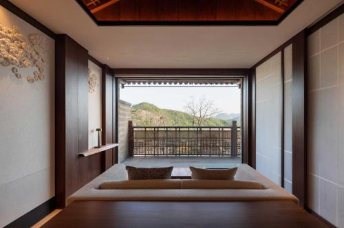 Balcony/terrace, Xitan&nbsp;Hotel&nbsp;Beijing 北京悉昙酒店 in Mentougou District