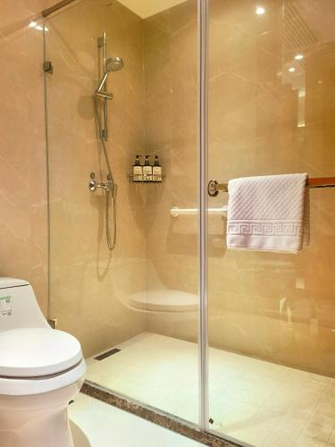 Beijing Jizhong Taurus Hotel - 샤워실
