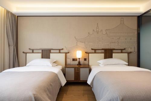 鸿胪花园酒店 入住赠送百威啤酒2瓶 鸿胪花园酒店 入住赠送百威啤酒2瓶