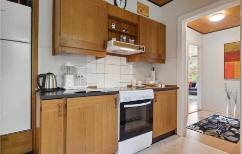Kitchen, Three-Bedroom Holiday Home In Romo in Romo Kirkeby