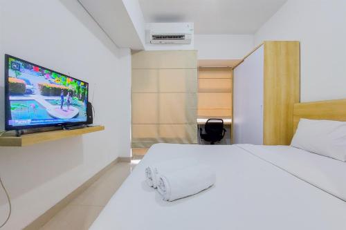 Good Deal and Homey Studio Serpong Garden Apartment By Travelio, Tangerang