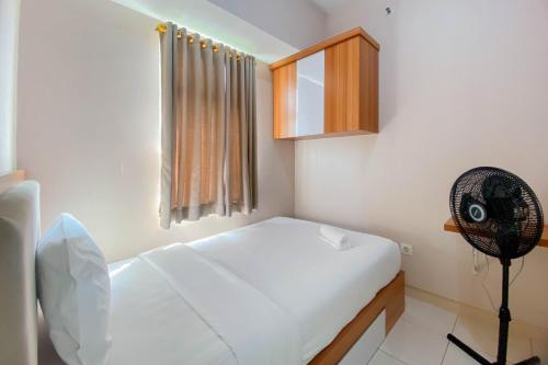 Restful and Tidy 2BR Apartment Springlake Summarecon Bekasi By Travelio