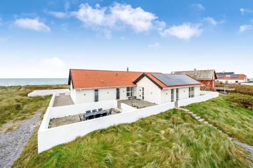 Exterior view, Pool And Activity House With A 180-Degree View Of The North Sea, Located At Lild Strand in Lild Strand