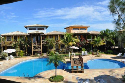 107 - Village aconchegante na praia de Itacimirim