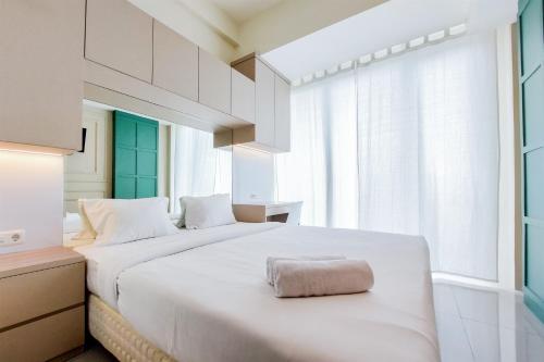 Cozy Stay Studio at Tree Park City BSD Apartment By Travelio, Tangerang Selatan