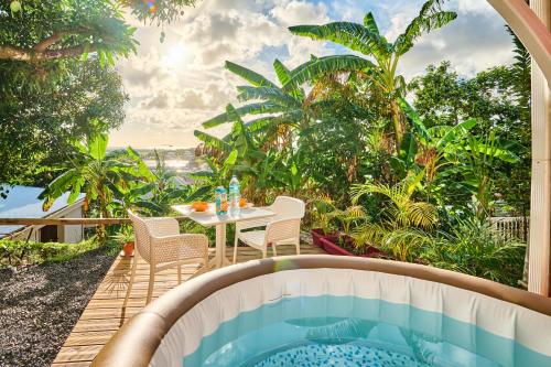 Suite avec spa vue et jardin - Location saisonnière - Ducos