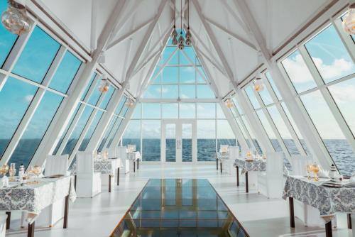 Restaurant, Furaveri Maldives - FREE return seaplane transfer for 7 night or more stays from 1 May - 31 Oct 2026 in Raa Atoll