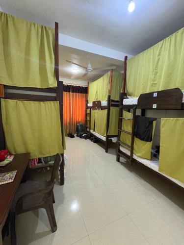 Bed in 6-Bed Mixed Dormitory Room room in Wake N Flow Weligama