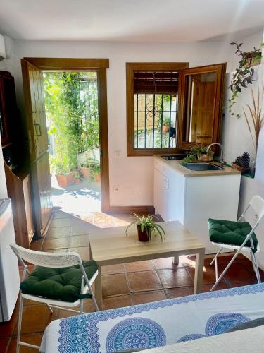 Casa Soportújar las flores